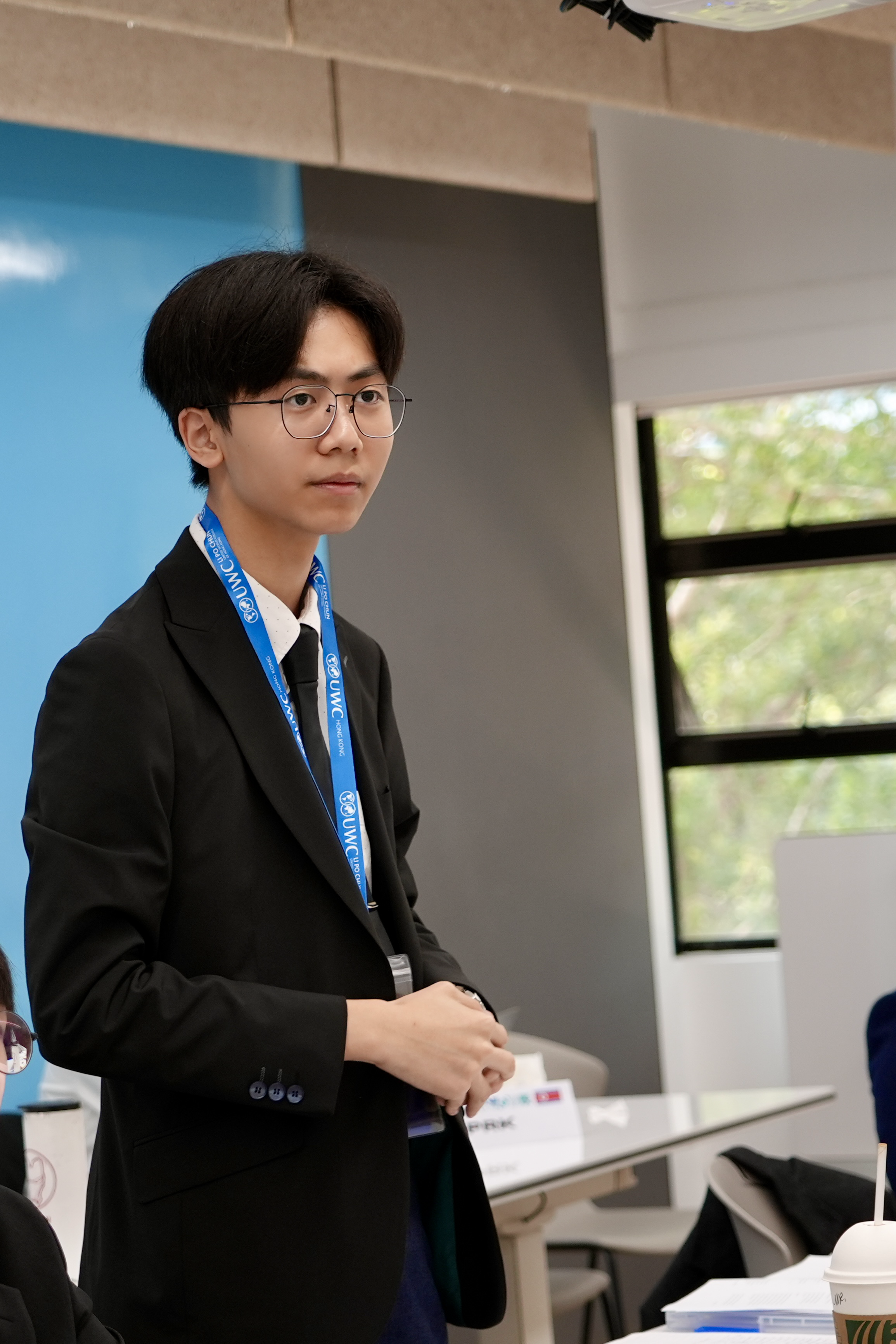 Woody Tai speaking at LPCMUN DISEC as Delegate of United Kingdom